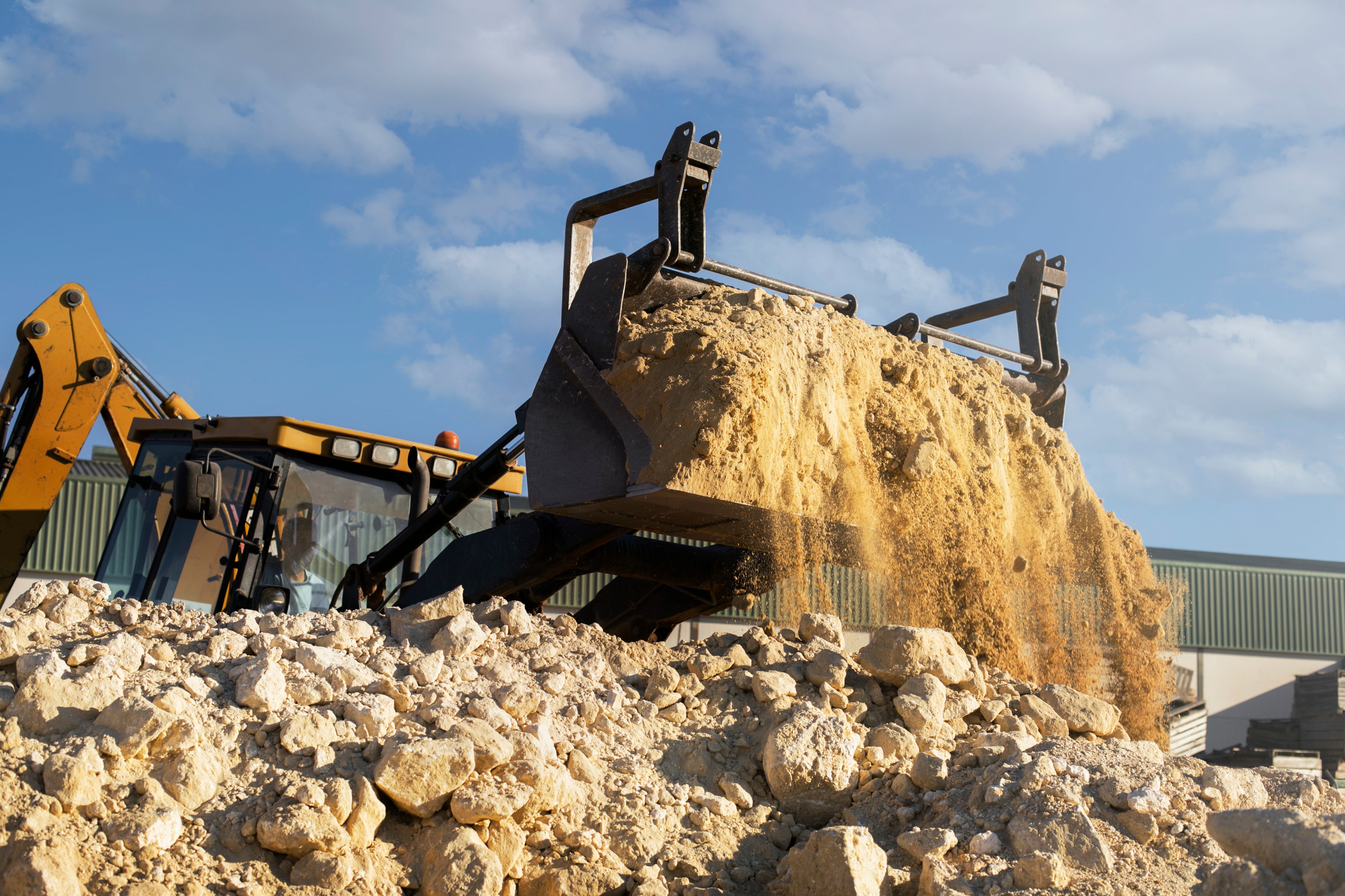 heavy-excavator-digging-day-light.jpg